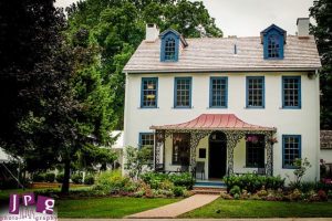 This Federal-period home was modernized in the mid-19th century with the addition of a porch.