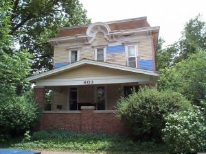 This Italianate house was updated in the 1920's with a masonry porch evoking the Arts and Crafts aesthetic.